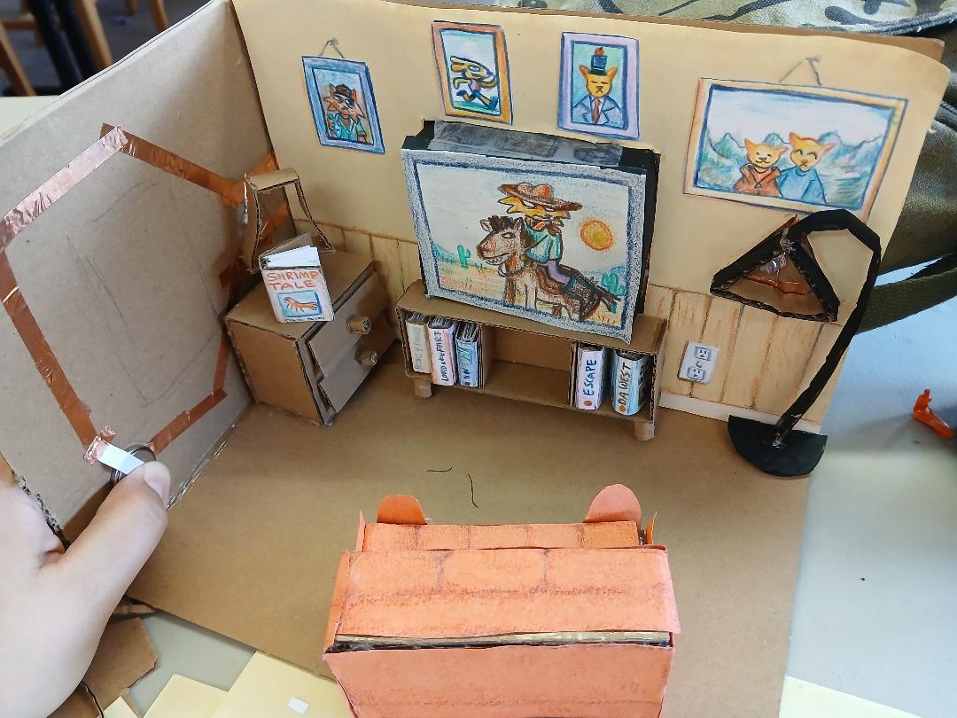 A paper and cardboard diorama project Carolina made