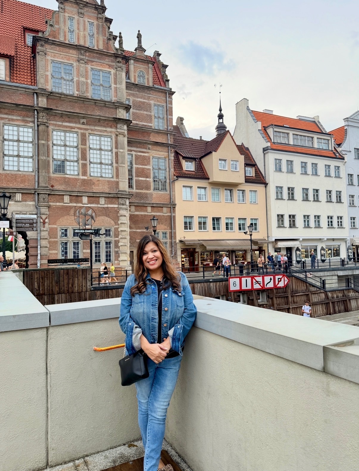 Yvonne in front of historic architecture in Gdansk, Poland