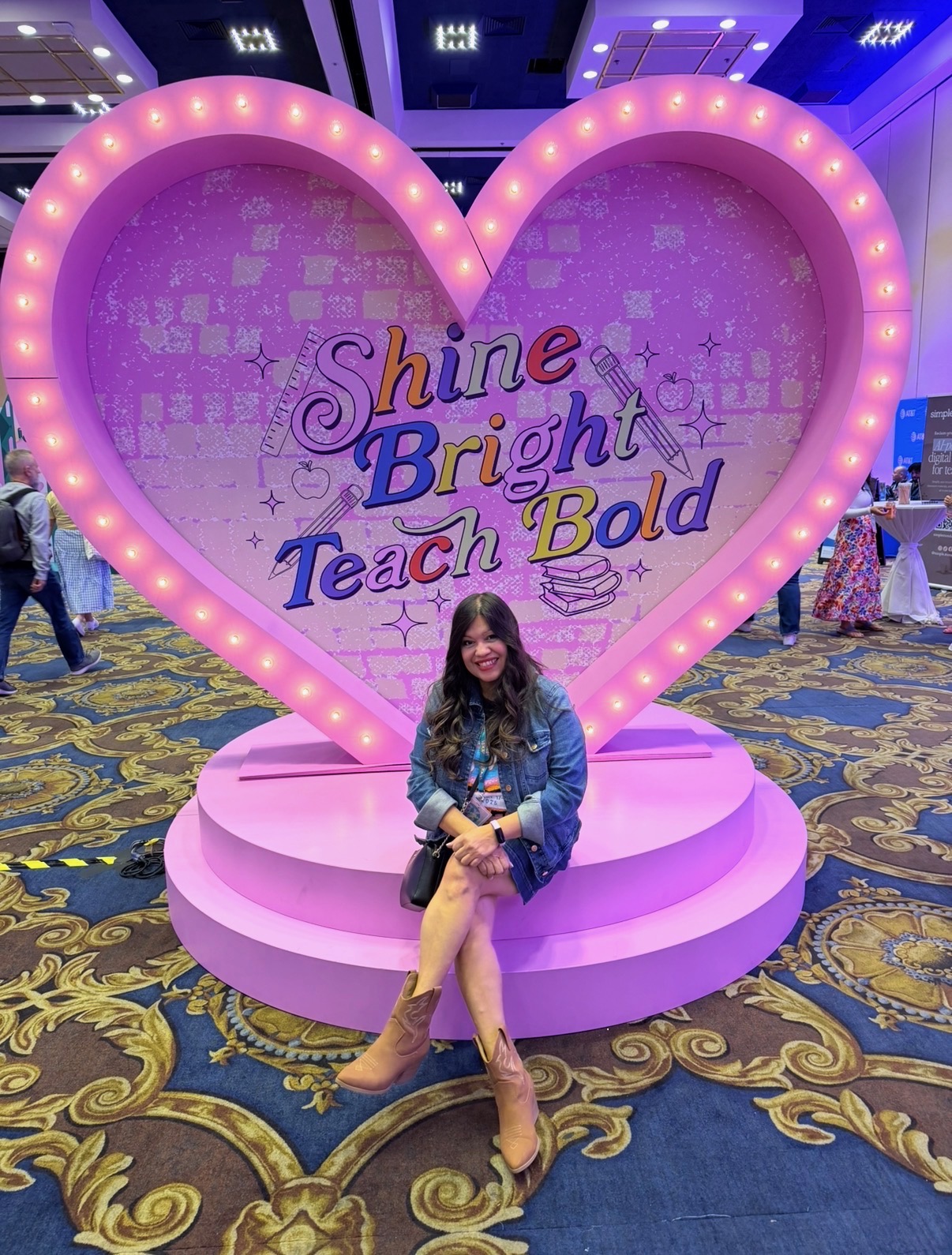Yvonne at a teacher conference photo booth
