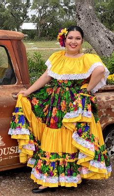 A Ballet Folklórico dancer in traditional costume